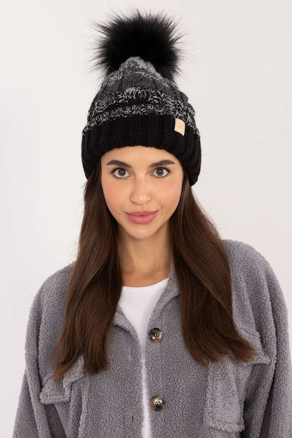 Rue Paris winter beanie illustrated in an outdoor setting, emphasising its fashionable plaid design and cozy fleece inner lining for ultimate warmth.