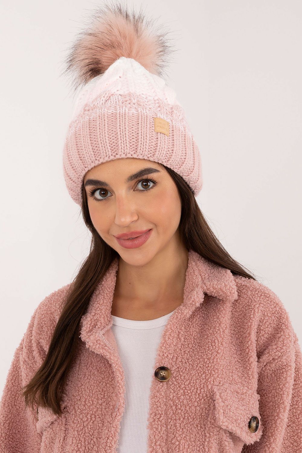 Elegant winter beanie with plaid pattern and pom-pom by Rue Paris, showcasing a cozy wool blend perfect for cold weather.