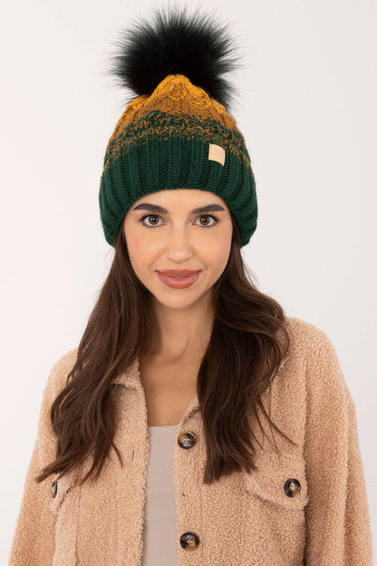 Elegant winter accessory from Rue Paris, showcasing a stylish beanie made from a luxurious blend of materials for ultimate comfort.