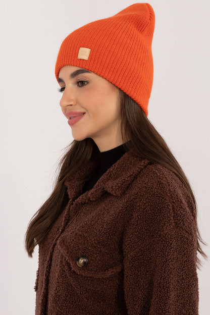 Stylish flat lay of the Classic Acrylic Beanie Hat by Rue Paris, accentuating its comfortable fit and timeless elegance against a contrasting backdrop.