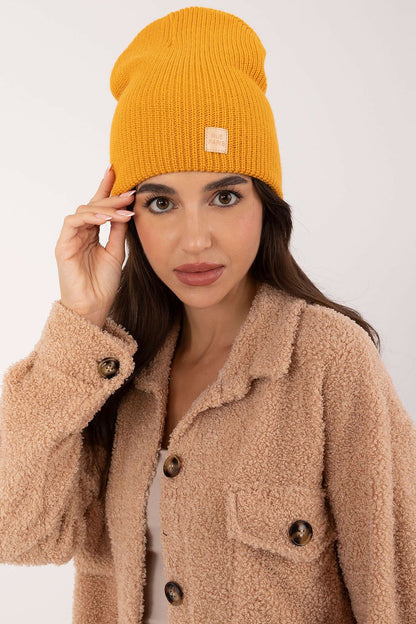 Stylish Classic Acrylic Beanie Hat by Rue Paris, made from soft acrylic material, perfect for both sporty and chic outfits.