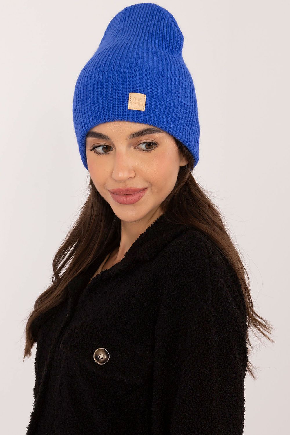 Luxurious soft acrylic beanie hat by Rue Paris, showcasing timeless fashion with a discreet character patch.