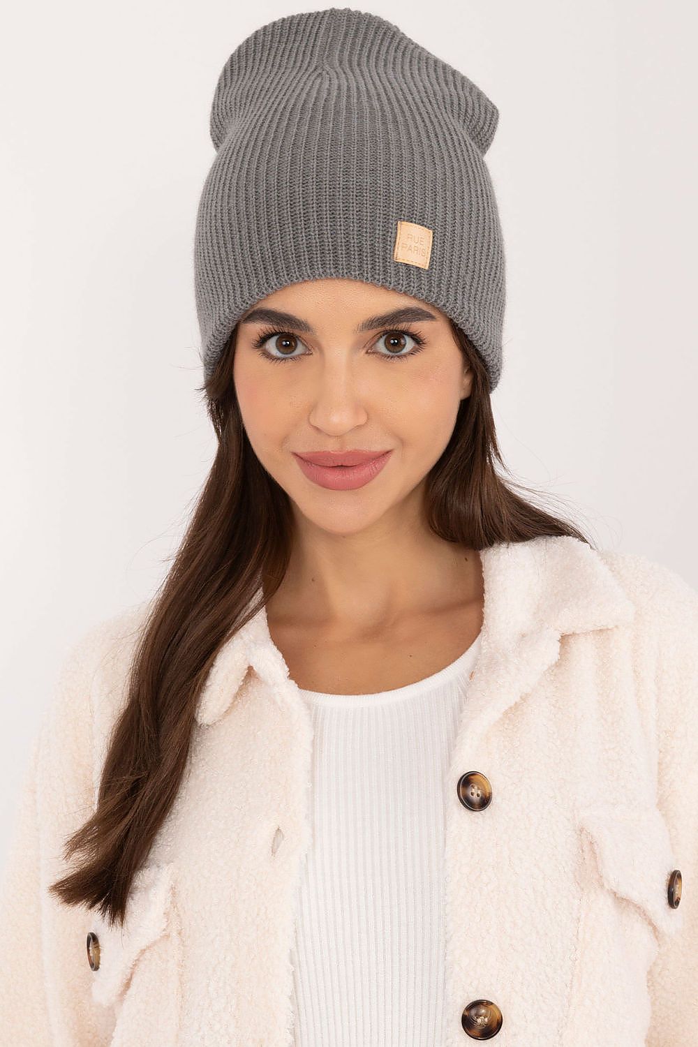 Elegant and comfortable beanie hat by Rue Paris, designed for both sporty and casual outfits.