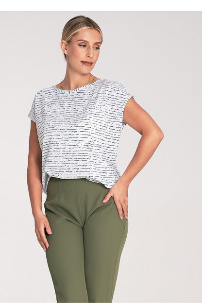 Model wearing Figl Elegant Short Sleeve Blouse, effortlessly embodying chic comfort and style suitable for various occasions.