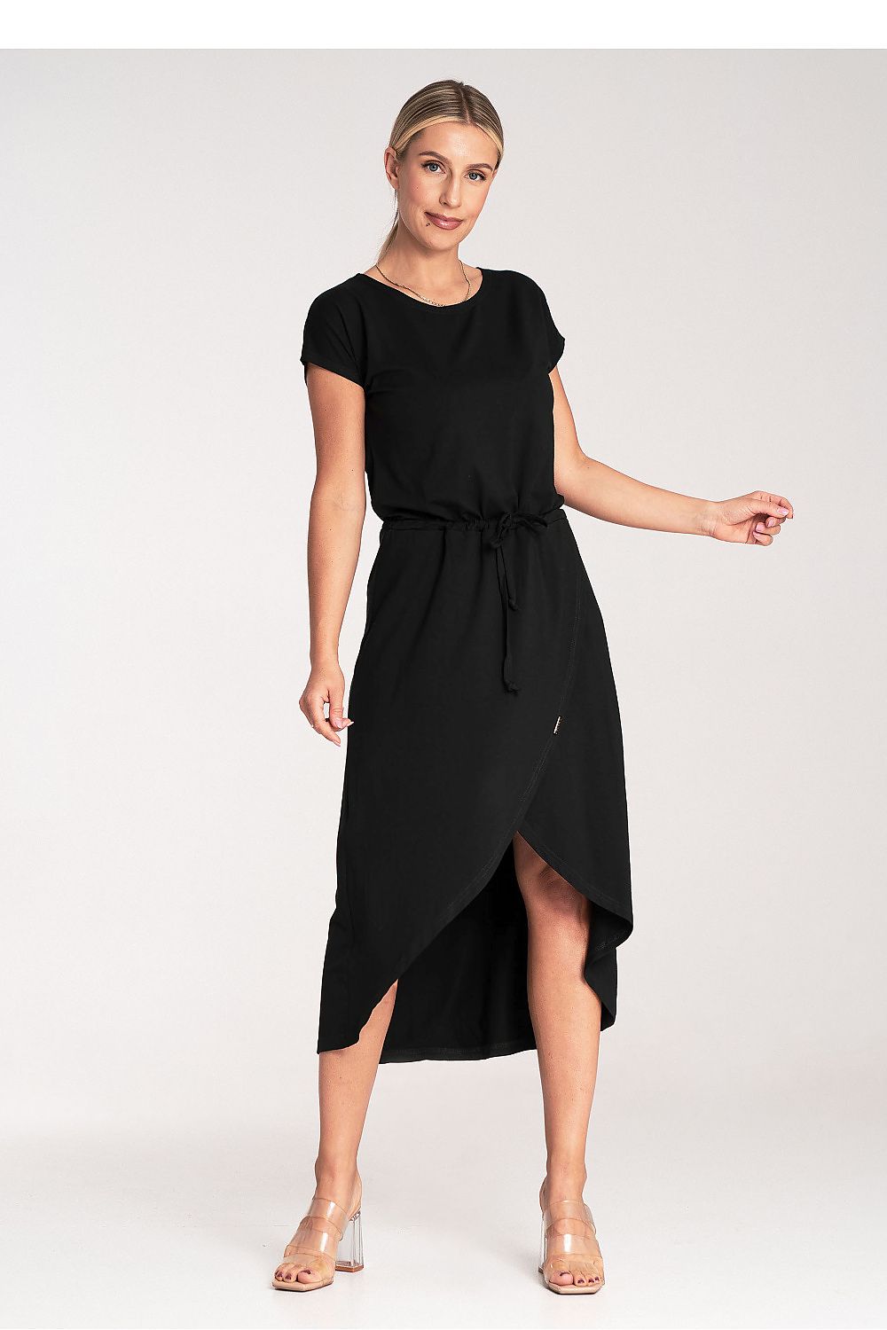 Model wearing Figl Asymmetrical Day Dress, illustrating its versatility for both daytime and evening wear.