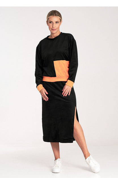 Close-up of the luxurious fabric of Figl's ladies' velour set, showcasing the soft and refined texture.