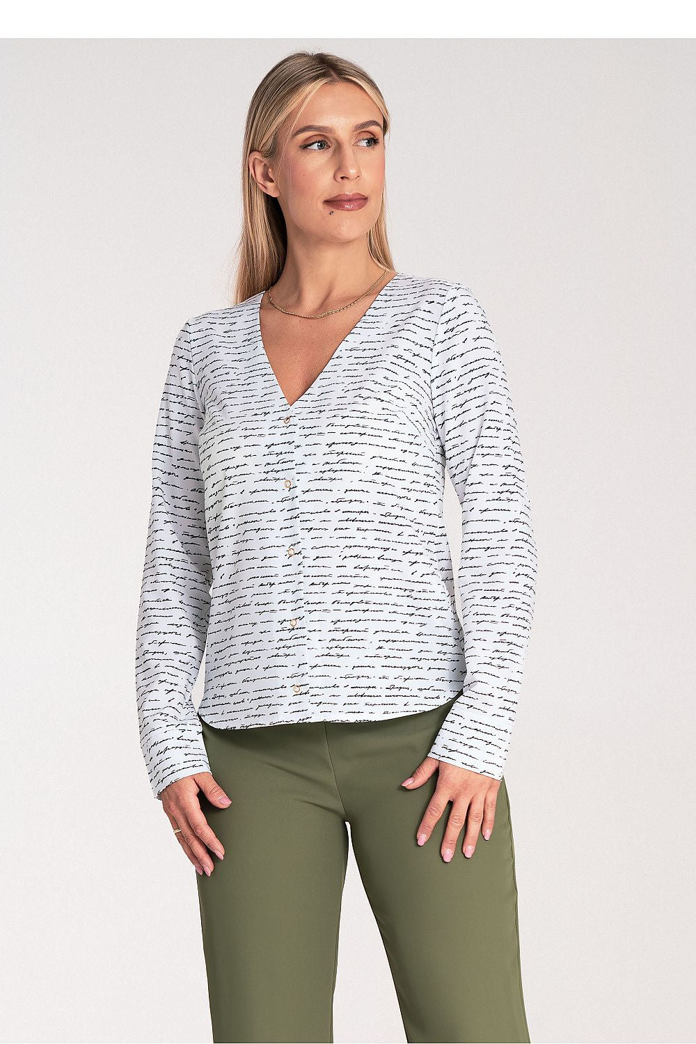 Fashion-forward Figl long sleeve fitted shirt displayed on a mannequin, illustrating its flattering fit and luxurious fabric blend.