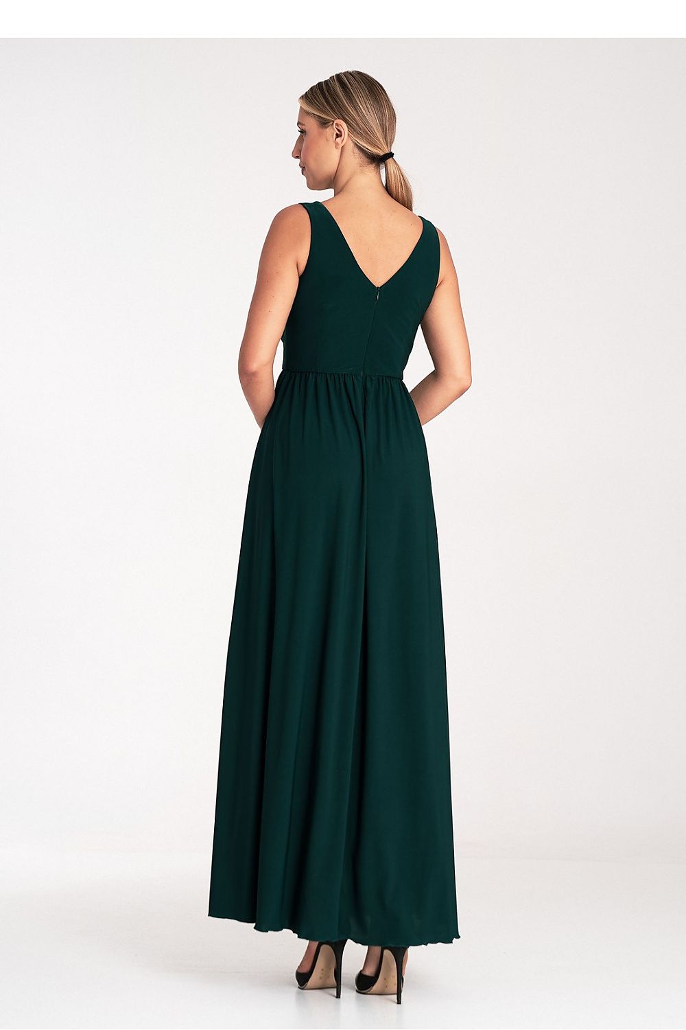 Close-up of Figl's Elegant V-Neck Maxi Dress showcasing exquisite fabric details and a stylish front slit, ideal for a glamorous evening look.