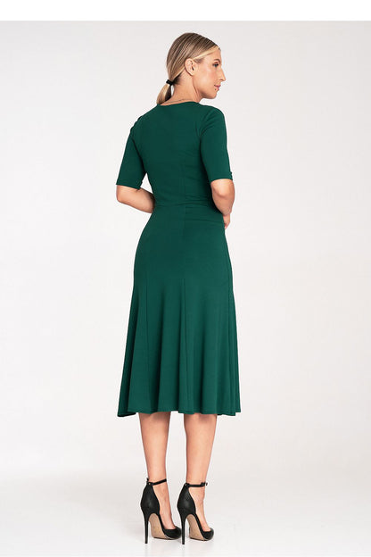 Figl's luxurious Midi Dress showcasing a beautiful V neckline and stylish 3/4 sleeves, perfect for any elegant event.