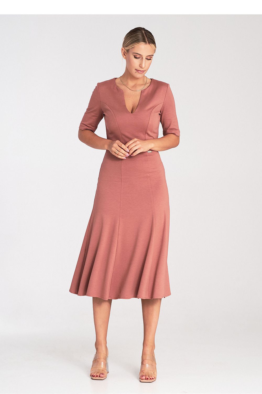Chic and stylish Midi Dress from Figl, designed with a V neckline and 3/4 sleeves for a flattering look.