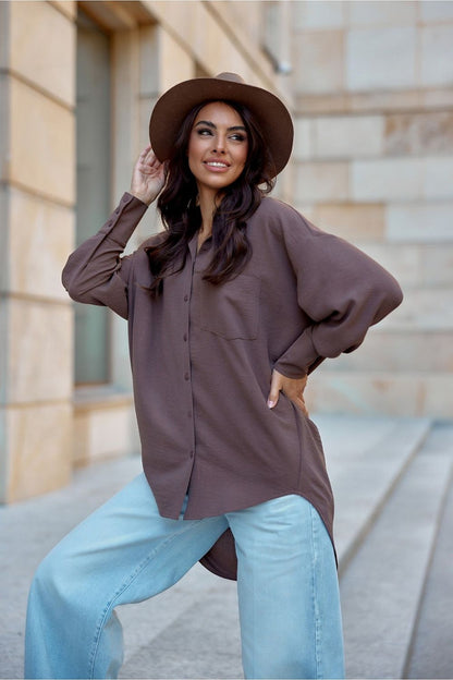 Stylish presentation of Roco Fashion's women's oversized shirt with a longer back and classic collar, epitomising comfort and sophistication in modern fashion.