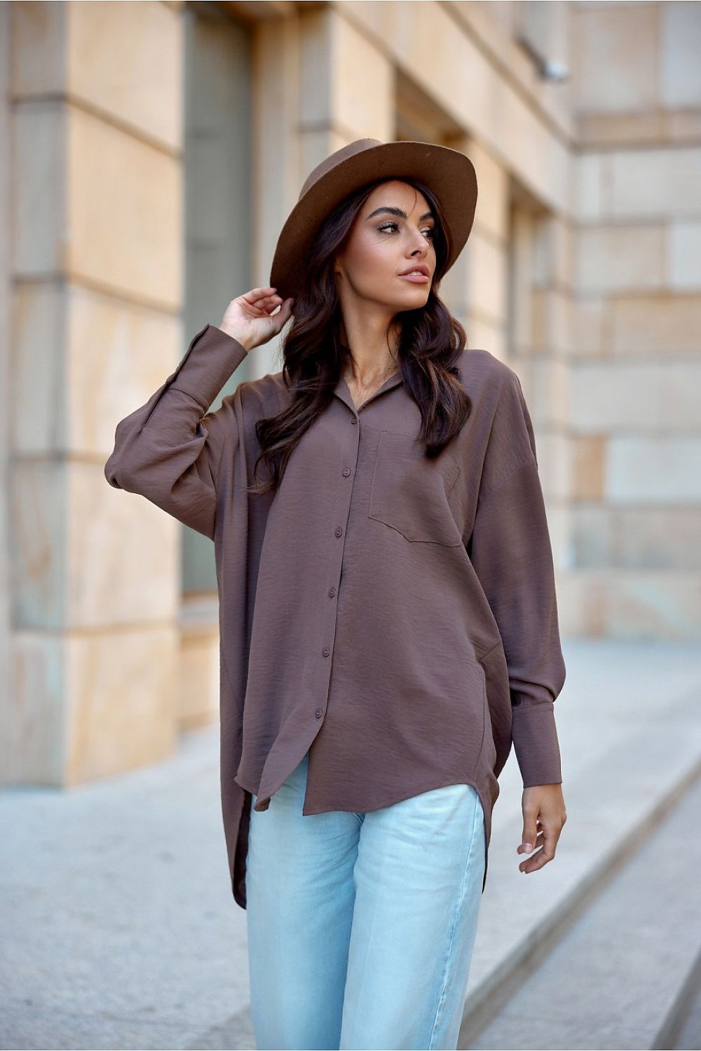 Elegant asymmetrical oversized long sleeve women's shirt with classic collar by Roco Fashion, designed for comfort and style.