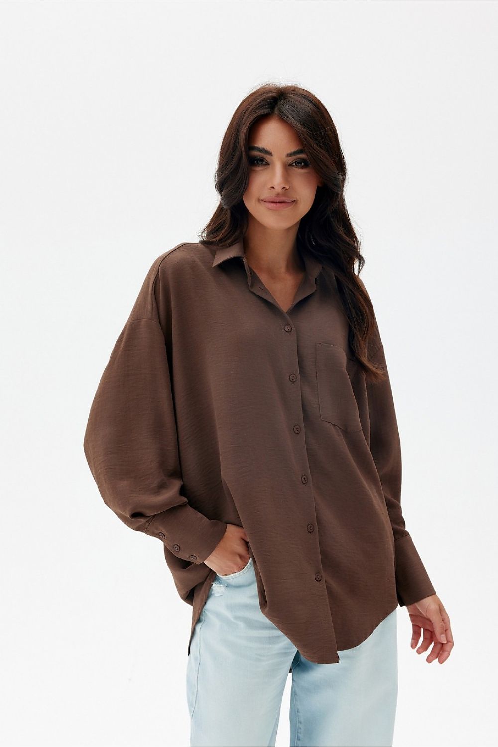 Chic view of the unique front button fastening on Roco Fashion's relaxed oversized women's shirt, perfect for casual and elegant occasions.