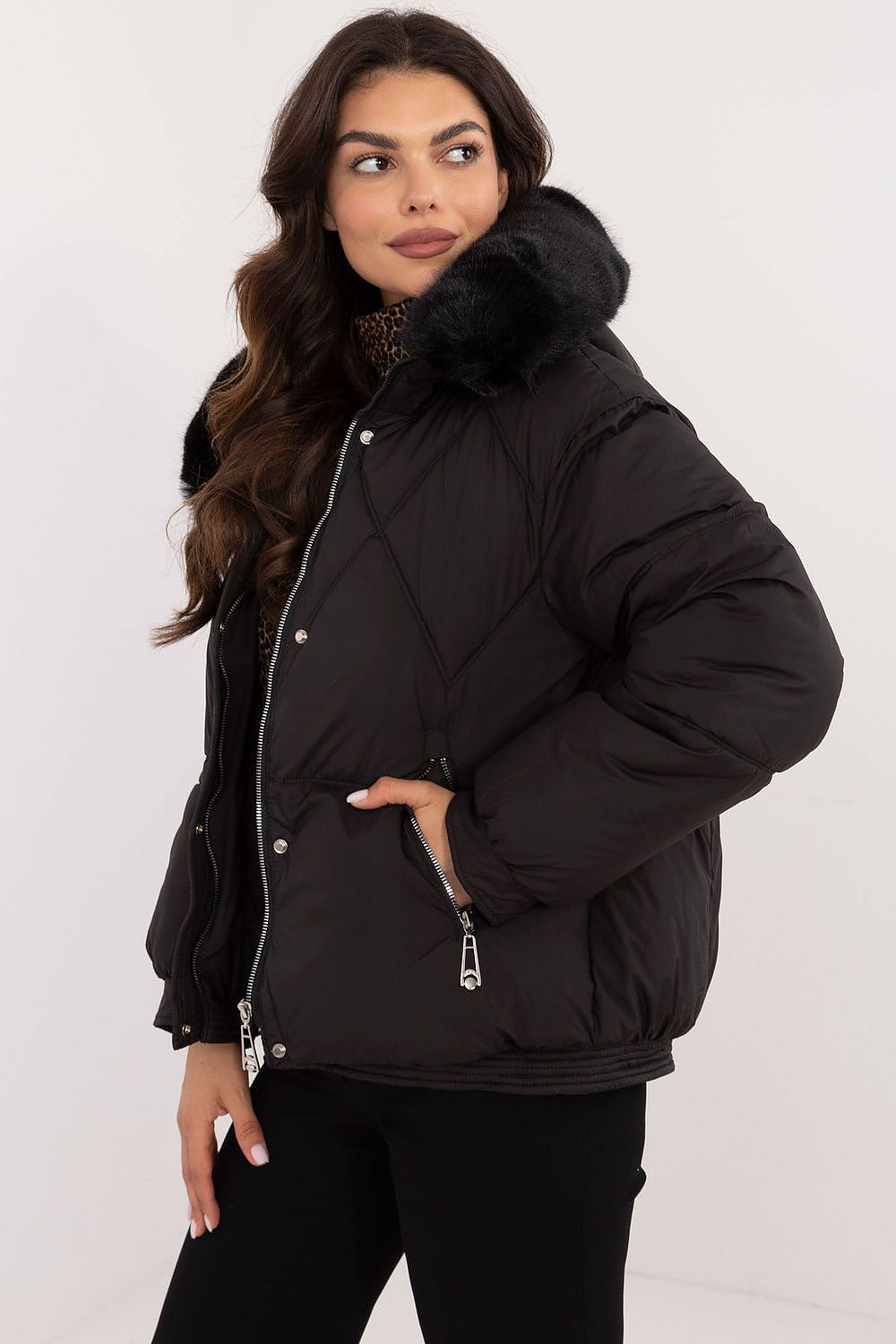 Women’s MBM casual winter jacket displayed in a vibrant colour, featuring a contemporary silhouette and practical zippered pockets, designed for comfort and luxury during colder months.