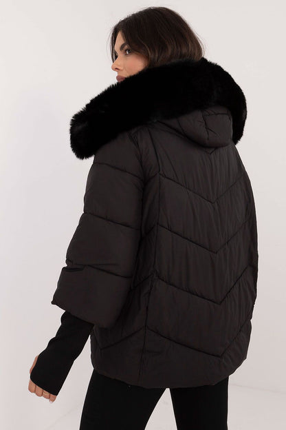 Elegant women's quilted jacket by MBM featuring a detachable fur hood, perfect for autumn and winter styling.