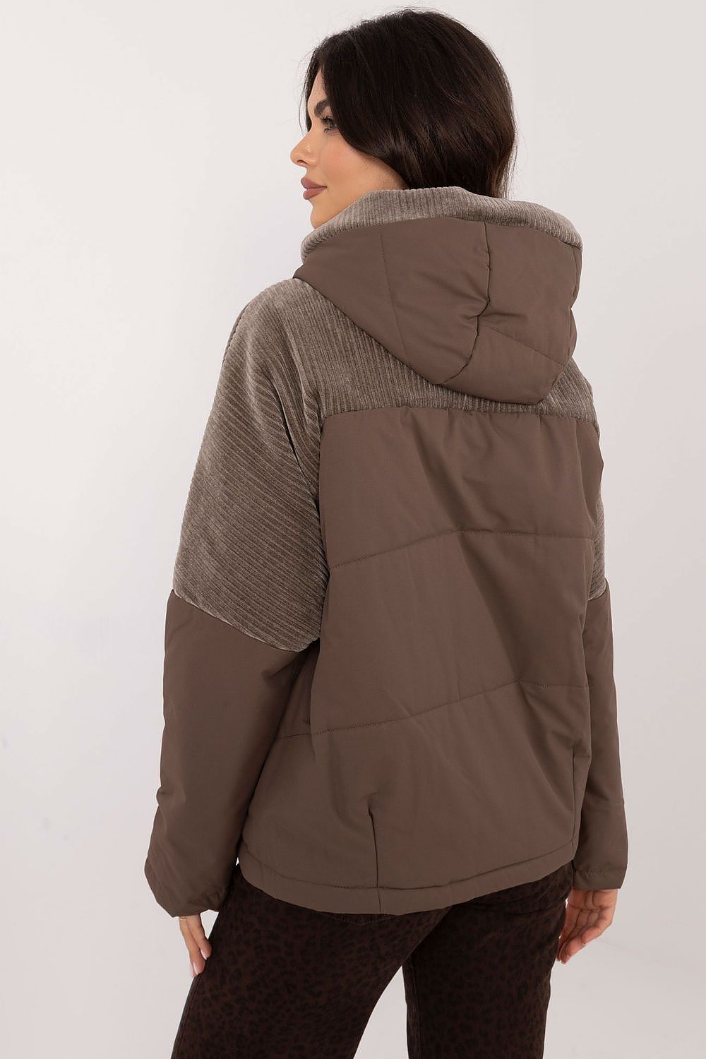 Luxurious women's quilted transitional jacket with hood by MBM, showcasing a stylish design perfect for casual autumn-winter outings.