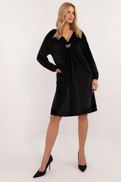 Side view of Italy Moda's elegant velour daydress with long sleeves, exemplifying class and style for modern women.