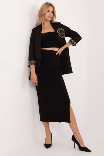 Model wearing Italy Moda's elegant midi pencil skirt, highlighting the feminine slit and sophisticated fit suitable for both casual outings and professional settings.
