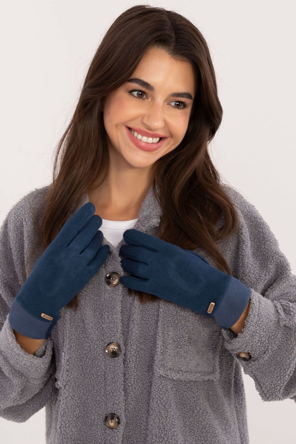 Elegant ribbed fingerless gloves adorned with an embroidered flower detail, designed for smartphone use, by AT - the perfect warm and stylish winter accessory.