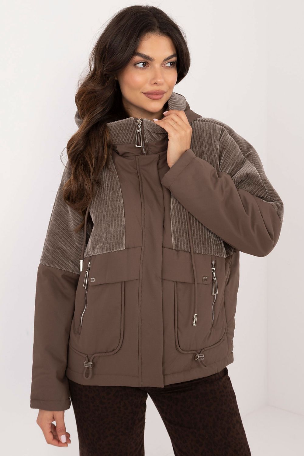 Elegant lightweight women's quilted jacket by MBM, with a sleek hood and zippered pockets, ideal for transitional seasons.