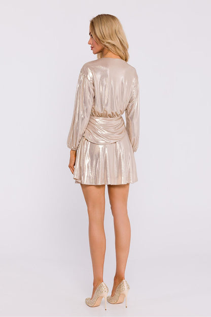 Detail of the Moe mini dress highlighting its luxurious knitted fabric and seductive V-cut neckline.