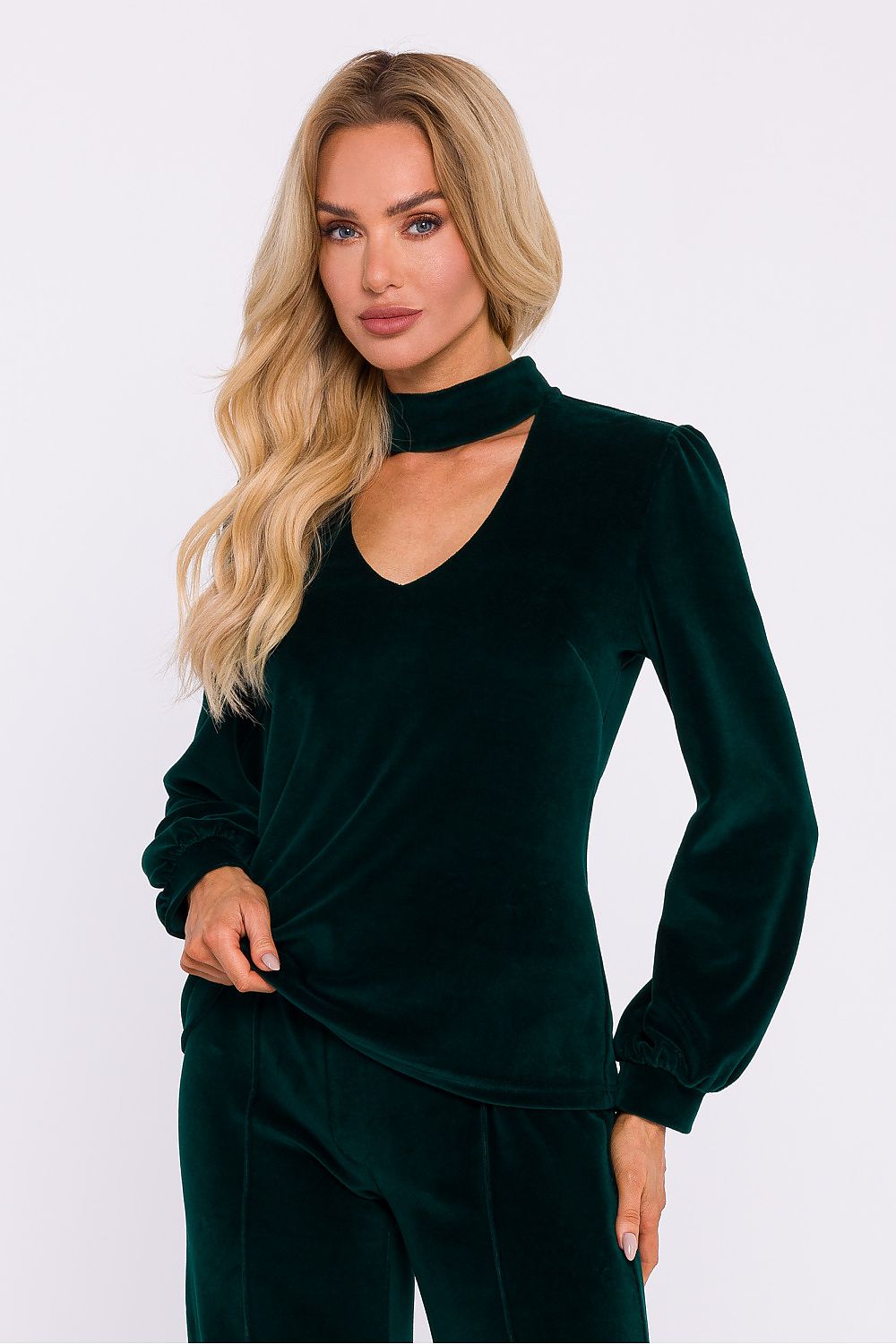 Luxurious elegant velour knit blouse by Moe, featuring a chic halter neckline and sophisticated button detail, perfect for stylish evening occasions.