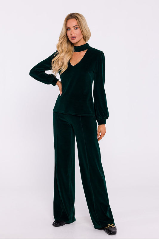 Elegant velour knit blouse by Moe featuring a halter neckline and sophisticated button detail, perfect for stylish evening outings.