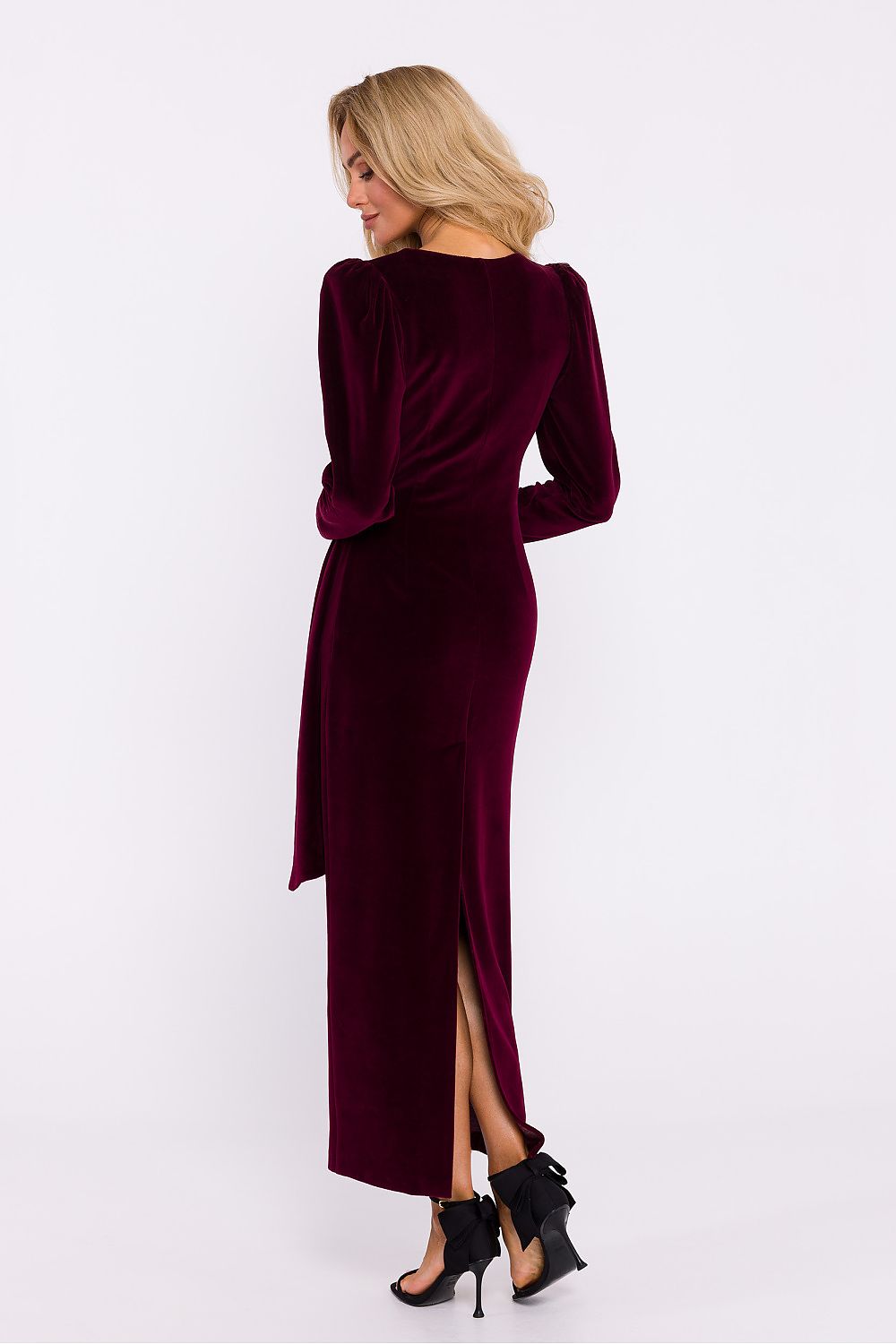 Back view of the Elegant Velour Knit Long Dress by Moe, highlighting the high slit and exquisite velour fabric draping gracefully.
