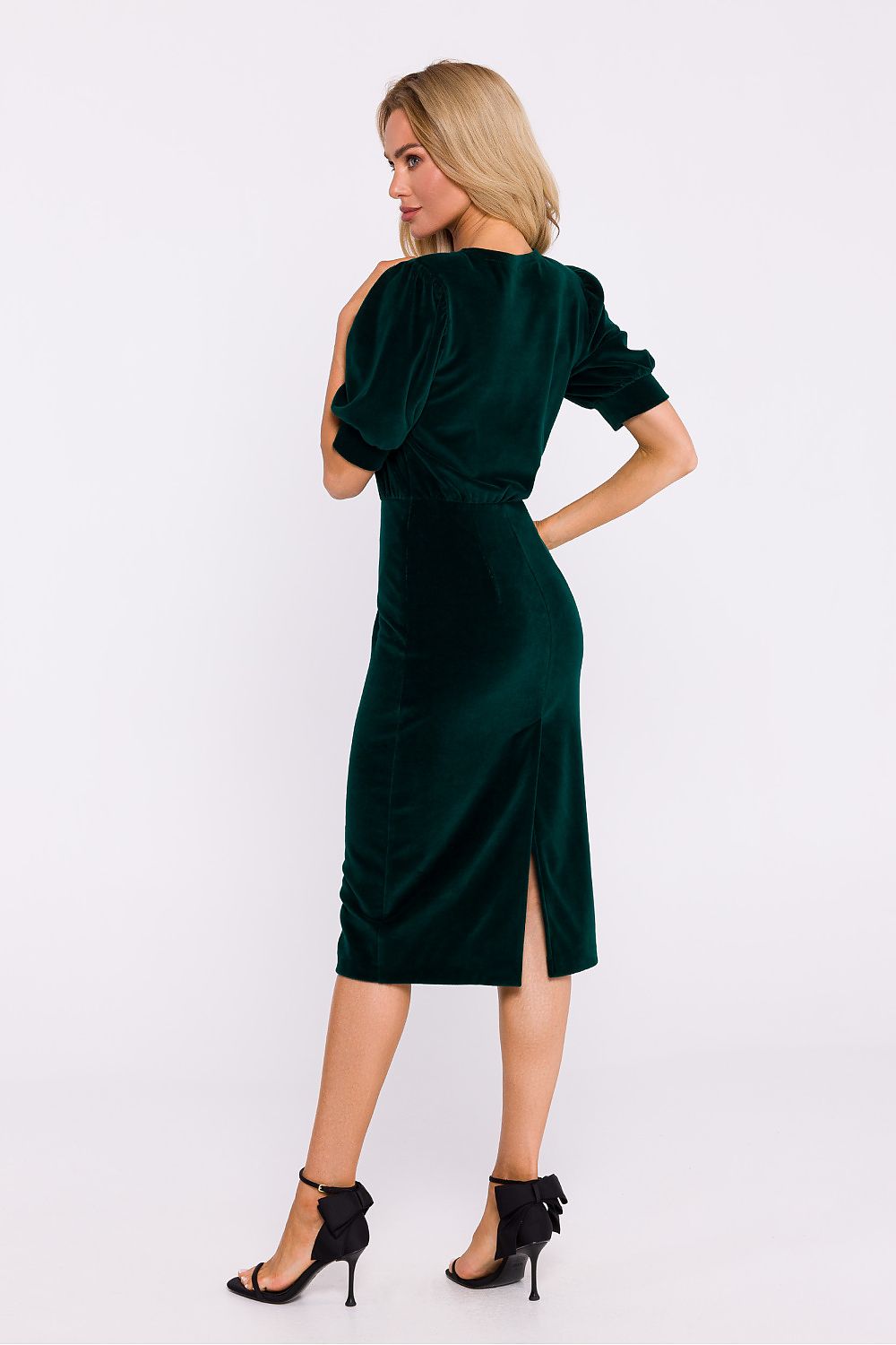 Side view of the Moe elegant dress featuring cuffed sleeves and a stylish pencil bottom, ideal for a chic ensemble at any formal event.