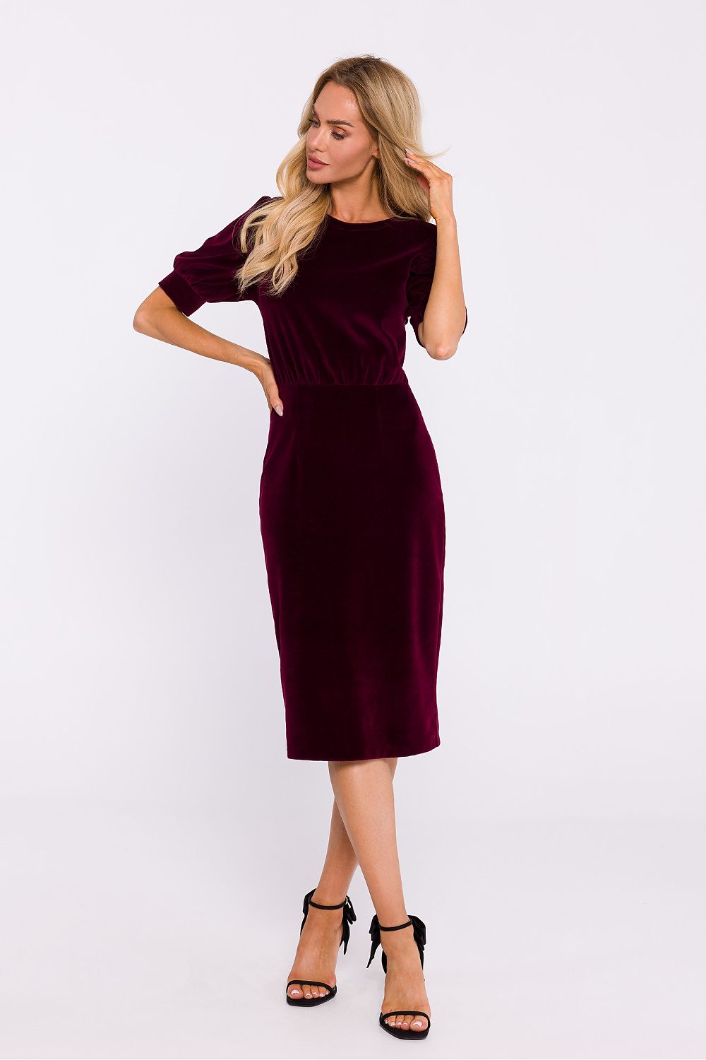 Elegant velour knit day dress by Moe featuring a pencil bottom and short cuffed sleeves, designed for sophisticated style and comfort.