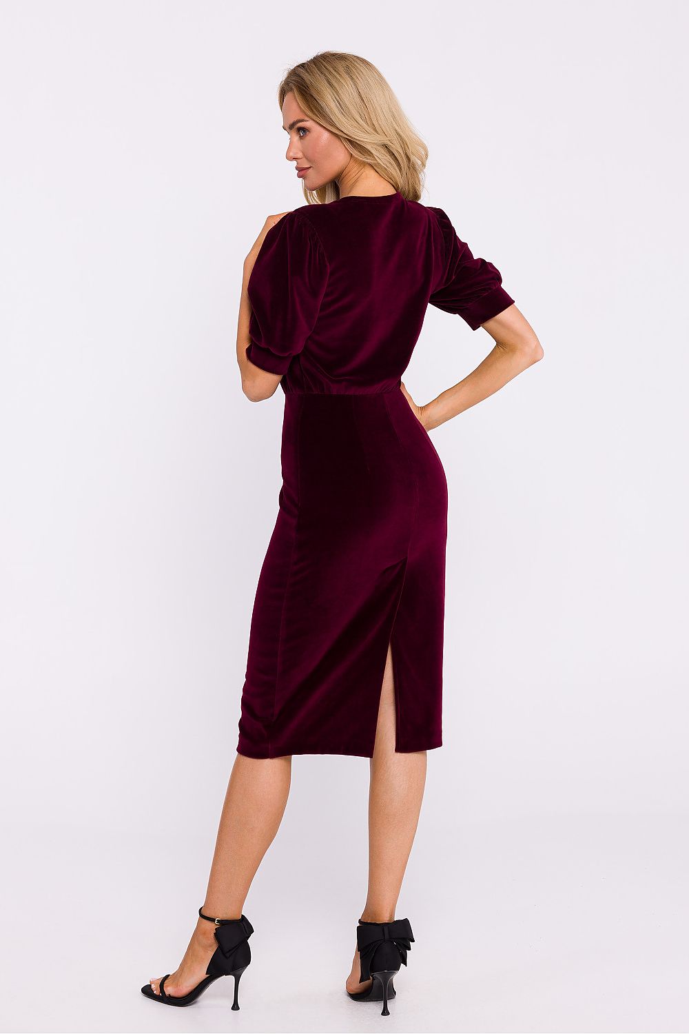 Sophisticated back view of Moe's elegant velour knit day dress, showcasing its lightweight design and side zipper for discreet closure.