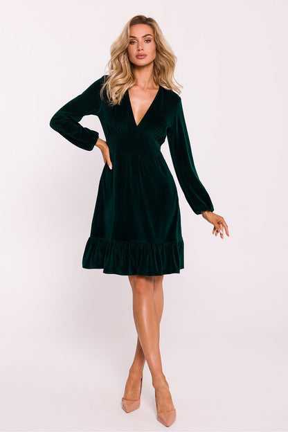 Elegant Velour Knit Daydress by Moe featuring a deep V-neck and flared ruffle hem, perfect for stylish occasions.