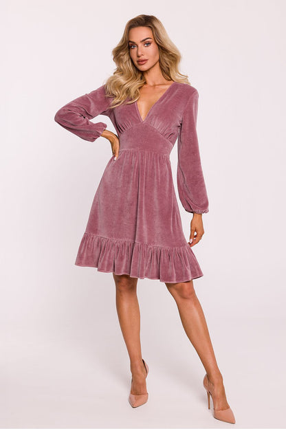 Back view of the flared ruffle hem daydress by Moe, highlighting the elegant silhouette and lightweight design.
