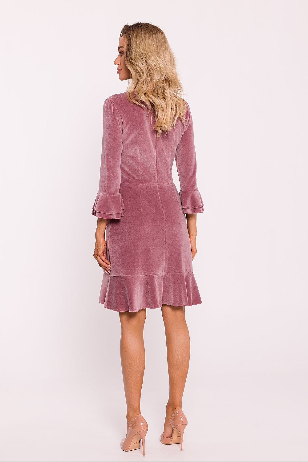 Elegant velour knit daydress by Moe featuring ruffled sleeves and a classic neckline, perfect for a sophisticated look.