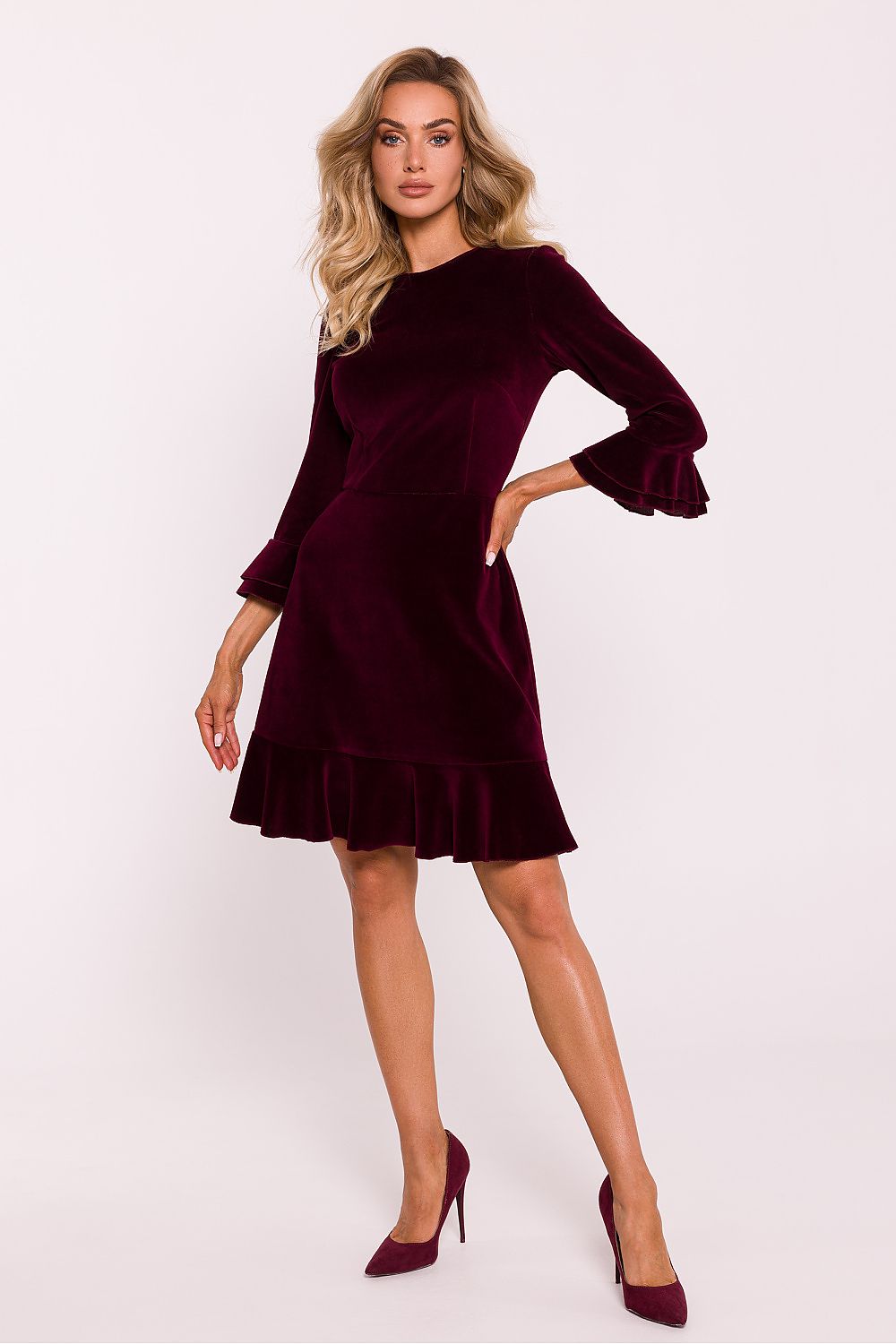 Full view of the Moe elegant velour knit daydress with below-the-knee length and ruffled details, ideal for stylish women.