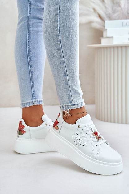 Sophisticated women's natural leather sneakers by Step in Style, designed for comfort with a modern platform and unique tulip details.