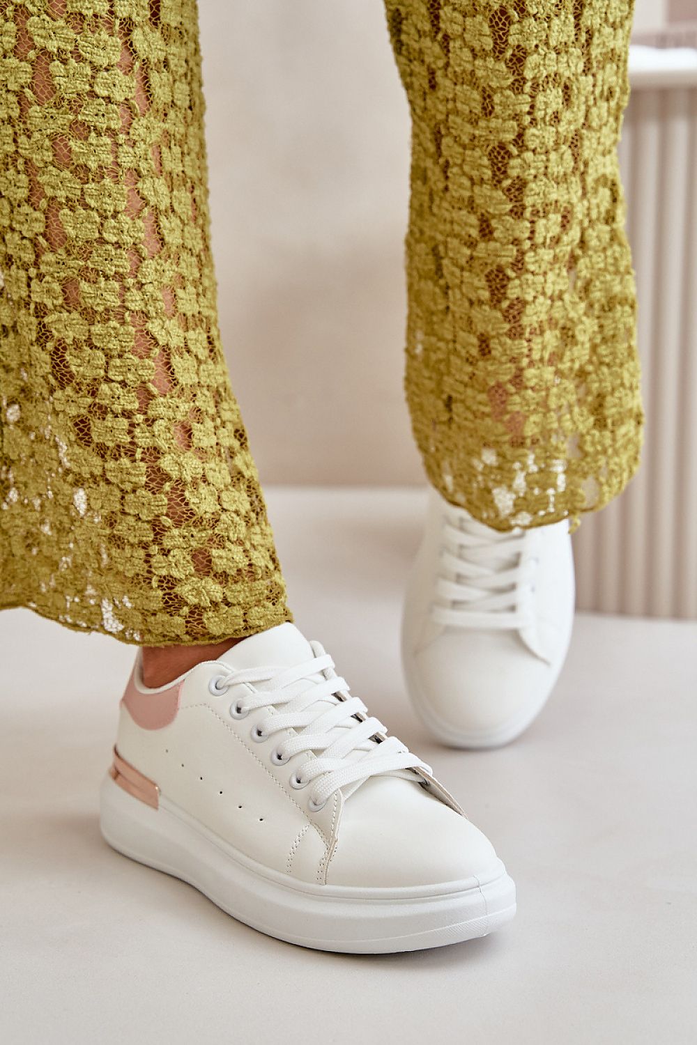 Fashionable and eco-friendly women's low sneakers featuring a luxurious mirrored platform, designed by Step in Style.