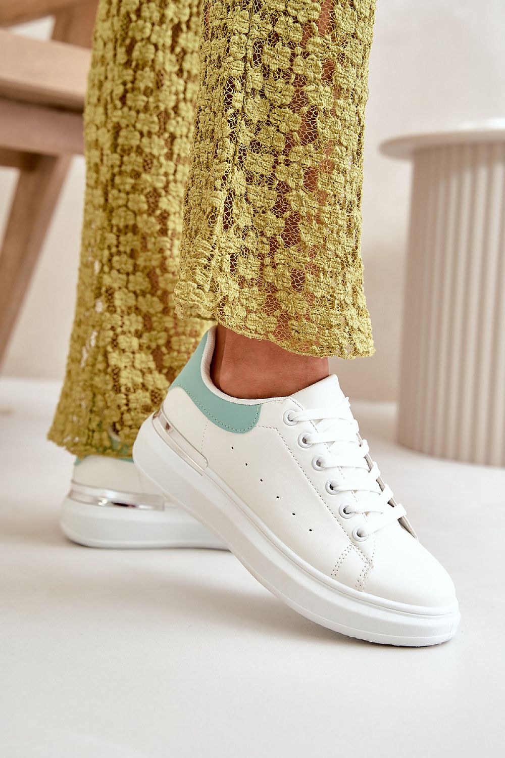 Sophisticated eco leather low sneakers for women with a mirrored platform from Step in Style, combining comfort and luxury effortlessly.