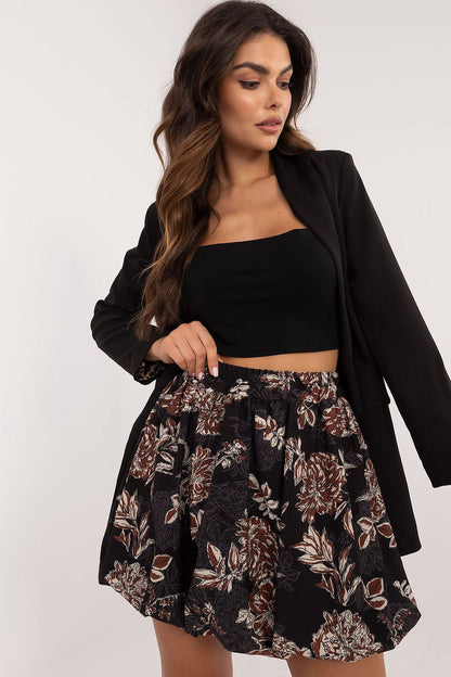 Italy Moda Floral Print Mini Skirt styled with a blouse, demonstrating its chic design and comfortable fit, ideal for casual yet elegant outfits.