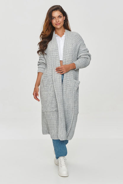 Luxury oversized women's cardigan by Makadamia in soft knit with pockets, perfect for elegant warmth on colder days.