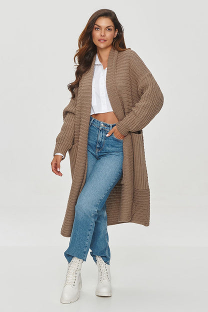 Makadamia luxury women's oversized cardigan with stylish ribbed texture and adjustable sleeves, perfect for casual outings or workwear.