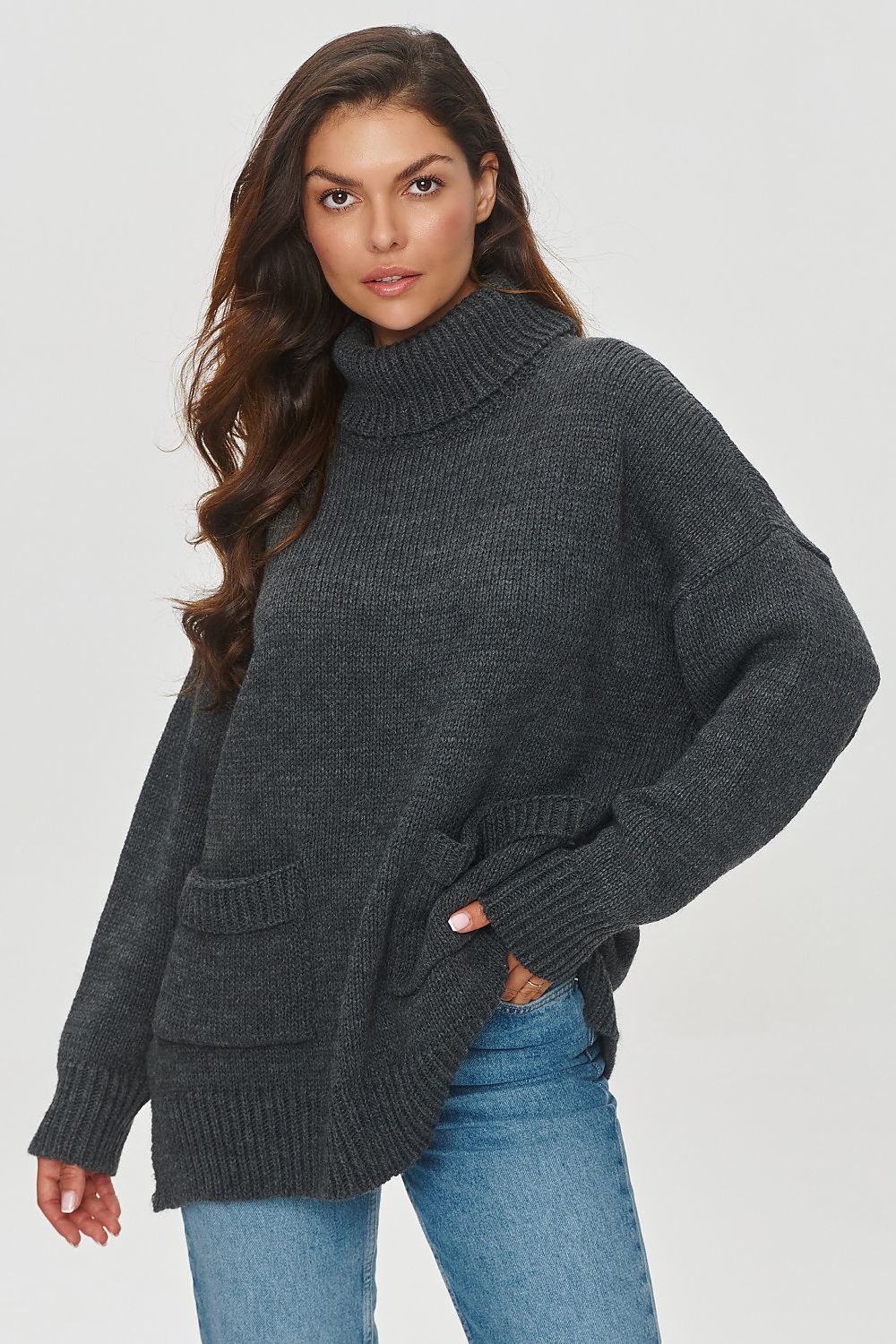 Luxurious Makadamia women's turtleneck sweater with a soft acrylic blend, featuring a chic loose fit and high permanent roll-up neckline, perfect for stylish winter layering.