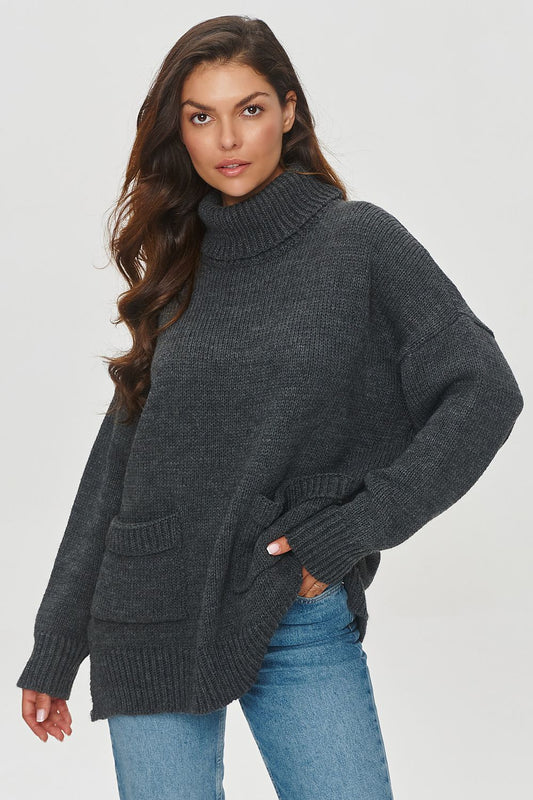 Luxurious Makadamia women's turtleneck sweater with a soft acrylic blend, featuring a chic loose fit and high permanent roll-up neckline, perfect for stylish winter layering.
