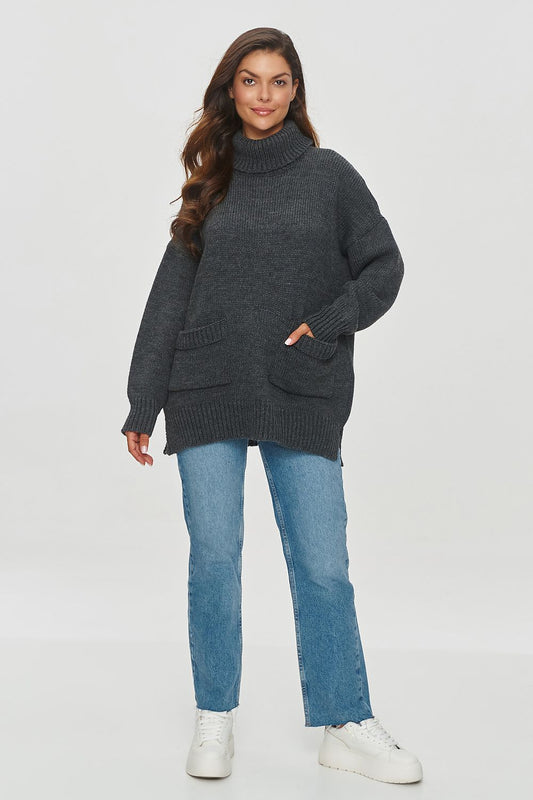 Elegant Makadamia women's sweater showcasing reglan sleeves and two functional patch pockets, designed for both comfort and style during colder days.