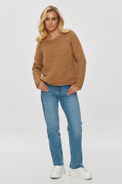 Elegant Makadamia sweater in soft fabric, showcasing a relaxed fit perfect for casual ensembles.