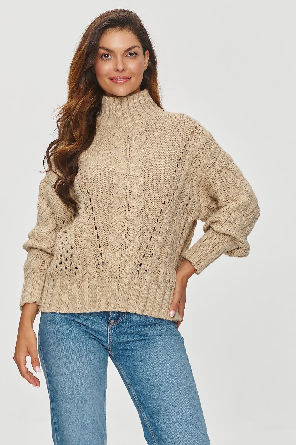 Luxury Women's Makadamia Turtleneck Sweater in braided design, featuring an oversize fit and high neckline, perfect for elegance and comfort.