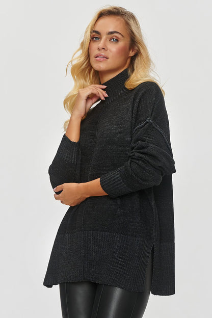Makadamia Women's Oversized Turtleneck Sweater in Warm Melange, featuring side slits and a relaxed fit for luxurious comfort.