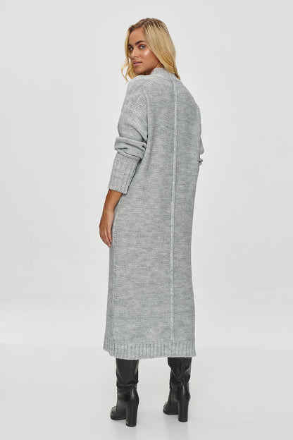 Sophisticated Makadamia Women's Long Sweater Dress showcasing a minimalistic design with a delicate vertical line, ideal for chic winter attire.