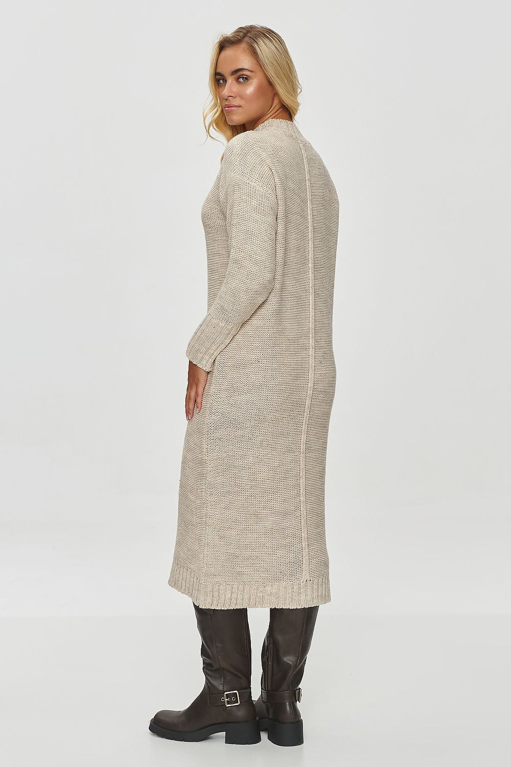 Elegant Makadamia Women's Long Sweater Dress in Classic Knit, featuring a crew neck and a chic below-the-knee silhouette, perfect for luxurious winter styling.