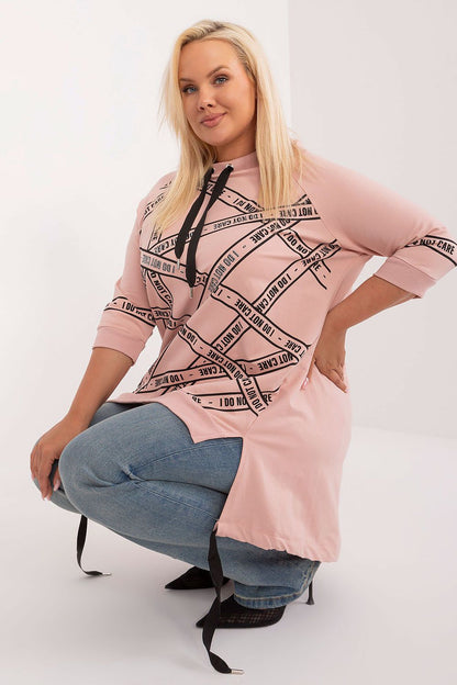 Stylish plus size blouse by Relevance with a unique asymmetrical cut, luxurious cotton-spandex fabric, embellished with rhinestones and a classic round neck, ideal for versatile wear.